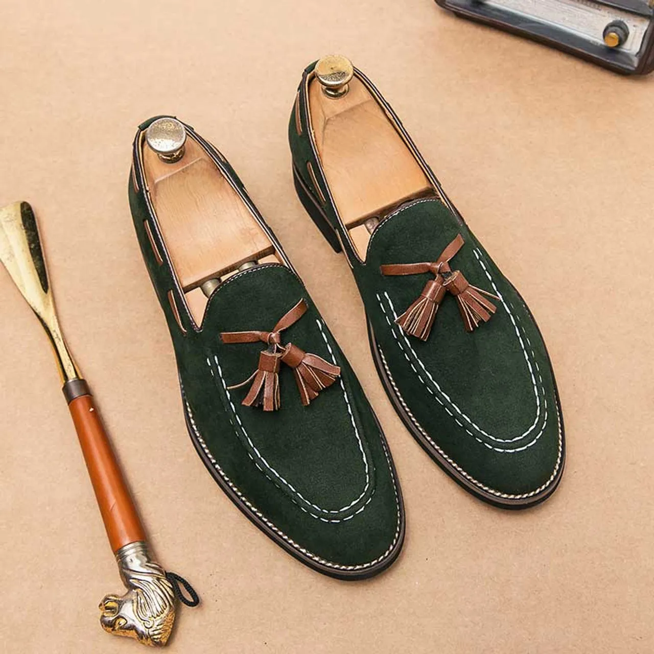 Green stitch accents tassel on top slip on dress shoe